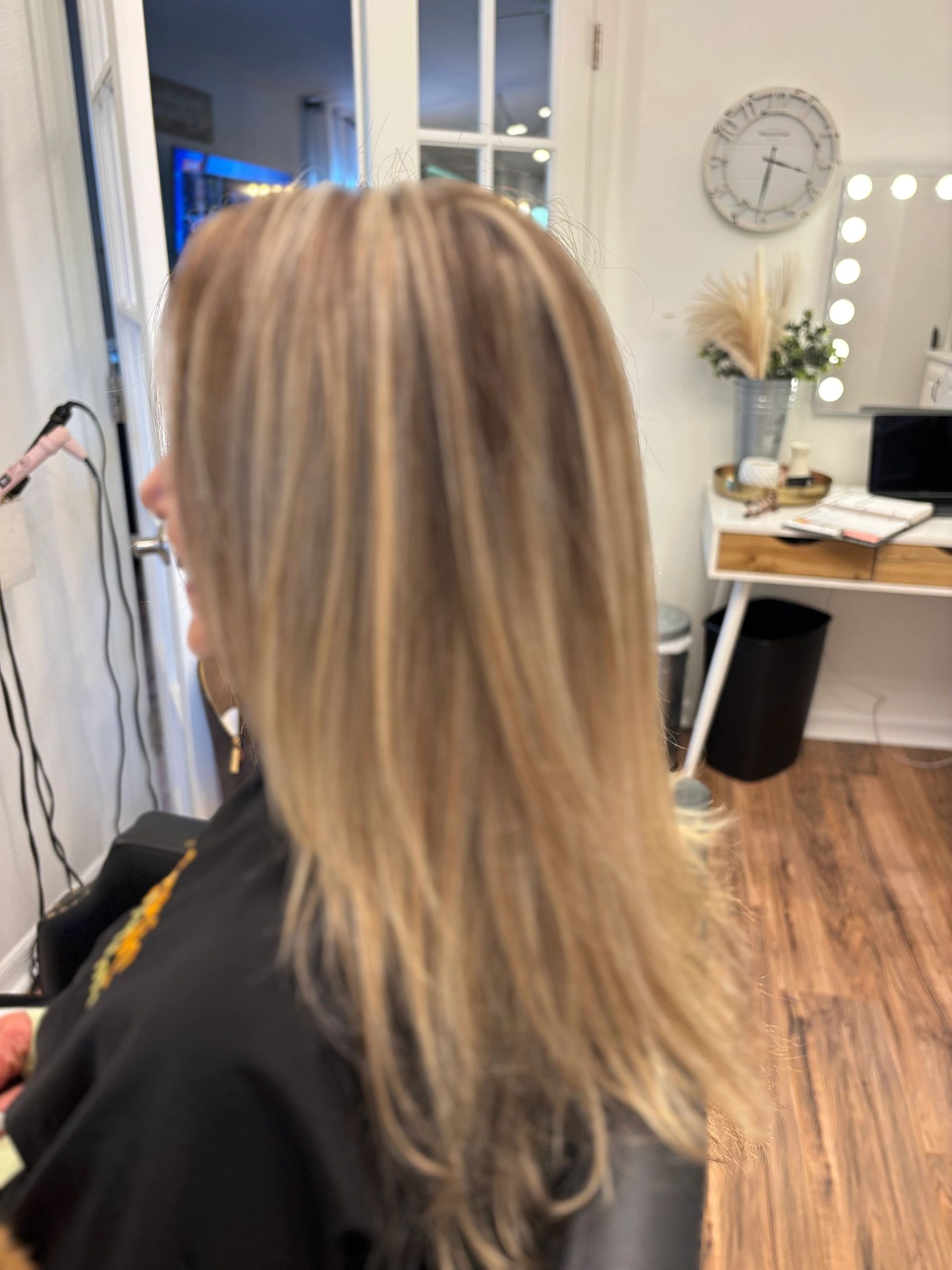 Long blonde hair in Studio O salon