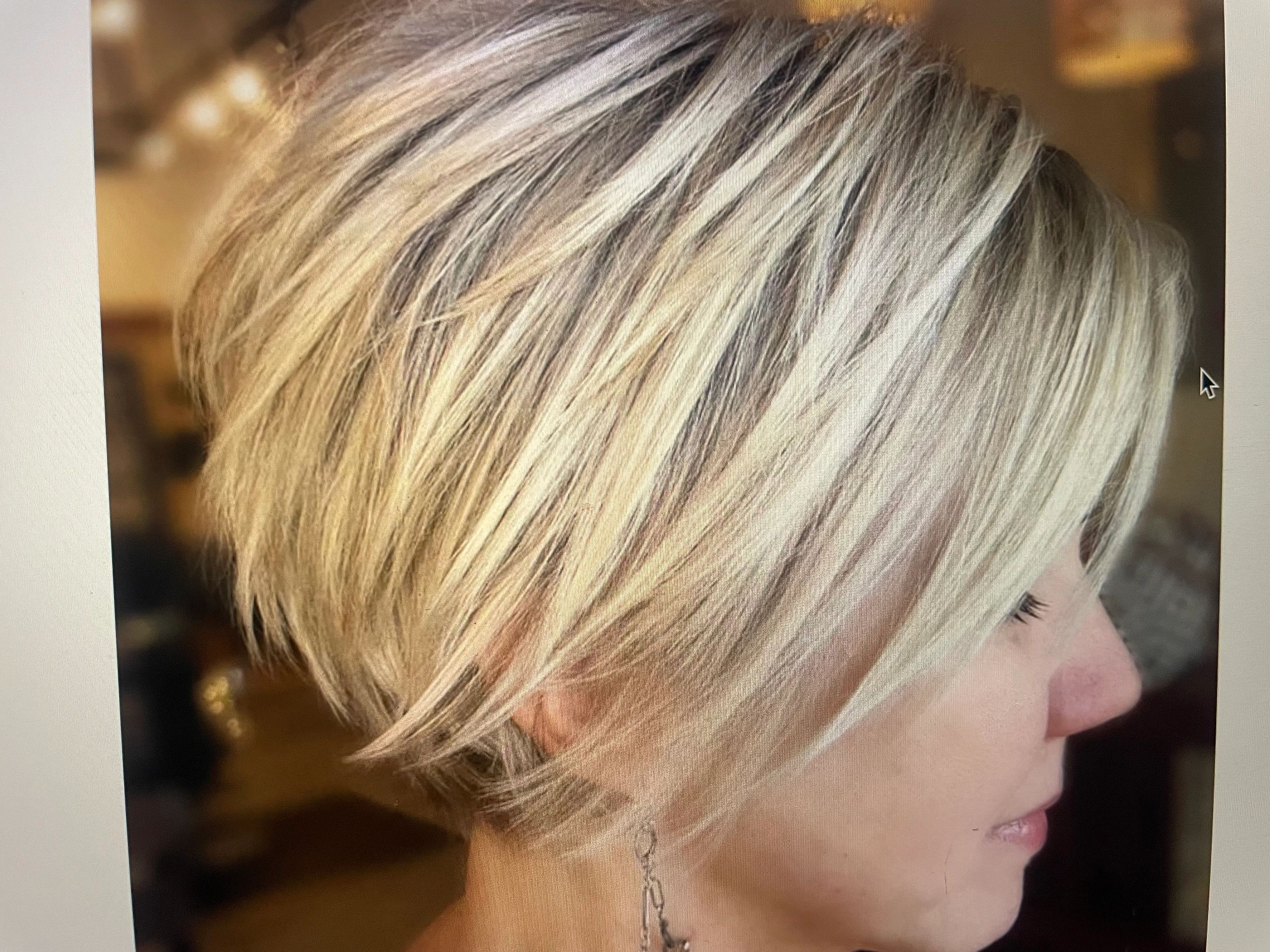 Short layered blonde bob with highlights